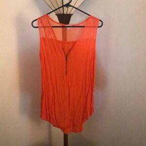 Pixley orange tank top.